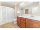 Bathroom features a double sink vanity, tub/shower combo, and neutral color palette at 523 Smokehouse Ln, Albemarle, NC 28001
