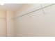 Walk-in closet with white metal shelving and neutral carpeting at 523 Smokehouse Ln, Albemarle, NC 28001