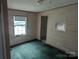 Bedroom with green carpet and a window view of the exterior at 5324 Weblee Ct, Kings Mountain, NC 28086