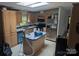 Kitchen featuring stainless steel appliances, wooden cabinetry, and a breakfast bar at 5324 Weblee Ct, Kings Mountain, NC 28086