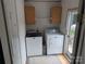 Laundry room with a washer and dryer, cabinets, and access to the exterior at 5324 Weblee Ct, Kings Mountain, NC 28086