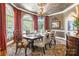 Formal dining room showcasing a chandelier, elegant decor, and natural light at 572 W Shiloh Unity Rd, Lancaster, SC 29720