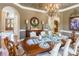 Dining room featuring hardwood floors, an elegant table, and decorative accents at 572 W Shiloh Unity Rd, Lancaster, SC 29720