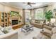 Cozy living room featuring a fireplace, comfortable seating, and hardwood floors at 572 W Shiloh Unity Rd, Lancaster, SC 29720