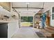 Open garage with view of the expansive backyard at 5914 Mt Holly Huntersville Rd, Charlotte, NC 28216