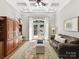 Comfortable living room with coffered ceiling, French doors, and a built-in entertainment center at 5955 Mountain Point Ln, Charlotte, NC 28216
