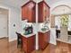 Charming office nook with custom cabinetry, granite countertop, and modern appliances, perfect for a work-from-home setup at 5955 Mountain Point Ln, Charlotte, NC 28216
