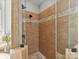 Tiled shower with glass doors and modern fixtures showcasing bathroom design at 5955 Mountain Point Ln, Charlotte, NC 28216