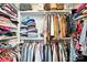 Walk-in closet with shelving and hanging racks, providing ample storage space at 606 Vega Nw St, Concord, NC 28027