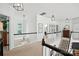 Bright hallway with white walls, black accents, and stylish lighting fixtures at 606 Vega Nw St, Concord, NC 28027
