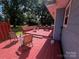 Back deck featuring plenty of seating, perfect for enjoying outdoor living and relaxing at 6109 Cora St, Charlotte, NC 28216