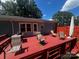 Outdoor back deck is perfect for entertaining and relaxing, with ample seating at 6109 Cora St, Charlotte, NC 28216