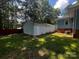 Backyard featuring the shed and a bit of the house at 6109 Cora St, Charlotte, NC 28216