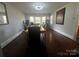 Spacious dining room with hardwood floors and large windows at 6109 Cora St, Charlotte, NC 28216