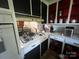 Kitchen featuring updated cabinets and stove at 6109 Cora St, Charlotte, NC 28216