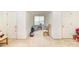 Large bonus room featuring neutral carpet and two large closets at 6619 Bittinger Ct, Charlotte, NC 28216