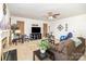 Bright and airy living room with neutral carpet and updated decor at 6619 Bittinger Ct, Charlotte, NC 28216