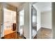 Hallway view showcasing bathroom, bedroom, and bedroom, all with hardwood floors at 814 Grace St, Kings Mountain, NC 28086