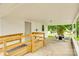 Covered porch with handicap ramp, offering an accessible entrance and an outdoor seating area at 814 Grace St, Kings Mountain, NC 28086
