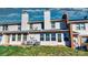 A view of the back of the property with grass and a cloudy blue sky at 825 21St Ne Ave, Hickory, NC 28601