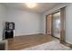 View of the living room with sliding doors leading to a screened porch and hardwood floors at 825 21St Ne Ave, Hickory, NC 28601