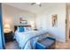 Bedroom featuring a bed with blue accents, providing a peaceful and stylish retreat for relaxation and rest at 8516 Profit Ln, Charlotte, NC 28215