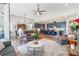Open-concept living area with a view of the kitchen and dining space, complete with stylish decor at 8516 Profit Ln, Charlotte, NC 28215