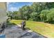 Backyard featuring a patio with a grill and large yard at 9807 Maywine Cir, Huntersville, NC 28078