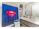 Full bathroom featuring a Superman themed shower curtain at 9807 Maywine Cir, Huntersville, NC 28078
