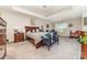 Spacious bedroom with carpet flooring, a king bed, and tray ceiling at 9807 Maywine Cir, Huntersville, NC 28078