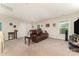 Spacious living room with carpet, natural light, comfortable seating at 9807 Maywine Cir, Huntersville, NC 28078