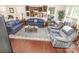 Cozy living room with hardwood floors, comfortable sofas, and stylish decor at 9807 Maywine Cir, Huntersville, NC 28078