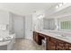 Main bathroom featuring double vanity, soaking tub, and separate shower at 1011 Wadsworth Ln, Indian Trail, NC 28079
