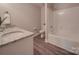 Clean and bright full bathroom with shower-tub combo and modern vanity at 1016 Forest Dr, Marshville, NC 28103
