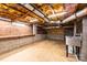 Unfinished basement with exposed ceiling, block walls and concrete floor at 1036 11Th Street Circle Nw Dr, Hickory, NC 28601