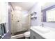 Modern bathroom with updated fixtures, glass shower, and stylish vanity; note the decorative shelf at 1036 11Th Street Circle Nw Dr, Hickory, NC 28601
