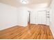 Bright bedroom with pristine white walls, wooden floors, closet and recessed lighting at 1036 11Th Street Circle Nw Dr, Hickory, NC 28601