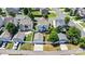 Aerial view featuring backyard space, a deck, a garage, and nearby neighborhood streets at 10509 Serape Rd, Charlotte, NC 28277