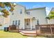 Exterior features a back deck, well-maintained siding, and a small, grassy yard at 10509 Serape Rd, Charlotte, NC 28277