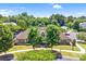 A community clubhouse with a nicely landscaped lawn and sidewalks on a sunny day at 10509 Serape Rd, Charlotte, NC 28277