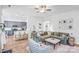 Comfortable living room showcasing an open floor plan with seamless access to the kitchen at 10509 Serape Rd, Charlotte, NC 28277