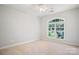 Bedroom with neutral carpet, a window that provides natural light and fresh air, and freshly painted walls at 11021 Dundarrach Ln # 40, Charlotte, NC 28277