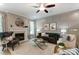 Inviting living room showcases fireplace and abundant natural light at 111 Longwood Rd # 59, Mooresville, NC 28115