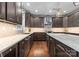Modern kitchen with granite countertops, stainless steel appliances, and ample cabinet space at 112 Steeplechase Ave, Mooresville, NC 28117
