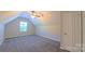 Bedroom features carpet, neutral paint, a vaulted ceiling, and a ceiling fan at 11514 Hattie Little St, Charlotte, NC 28269