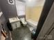 View of bathroom with toilet, vanity, tub and tile floors at 119 Hemlock Ave, Kannapolis, NC 28081