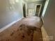 View of bedroom with a fireplace and carpeted floors at 119 Hemlock Ave, Kannapolis, NC 28081