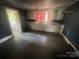 View of kitchen with cabinets and vinyl flooring at 119 Hemlock Ave, Kannapolis, NC 28081