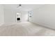 Primary bedroom with neutral carpet, ceiling fan and bright window at 1300 Dali Blvd, Mount Holly, NC 28120