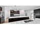 Bright kitchen featuring stainless steel appliances, a large island, and a view to the backyard at 1300 Dali Blvd, Mount Holly, NC 28120